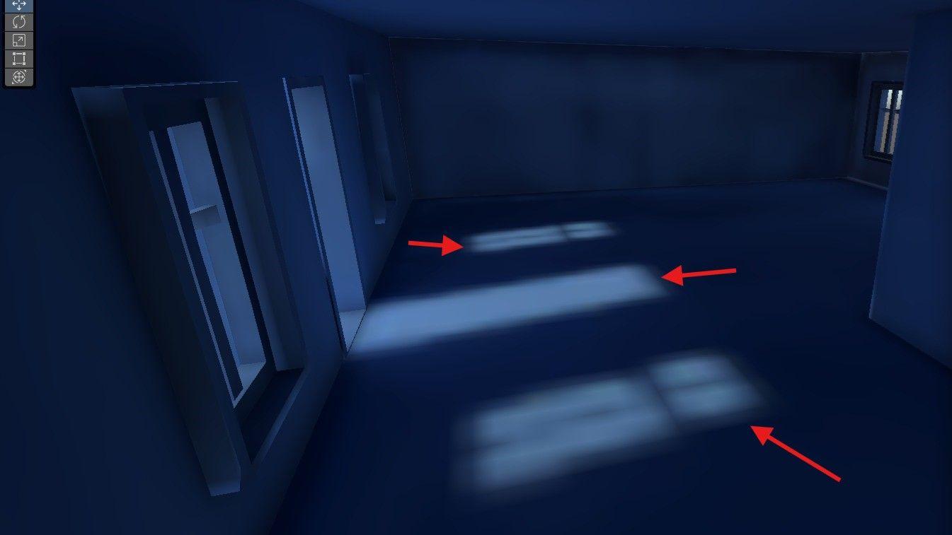A dark, blue room with light coming through the door and windows.