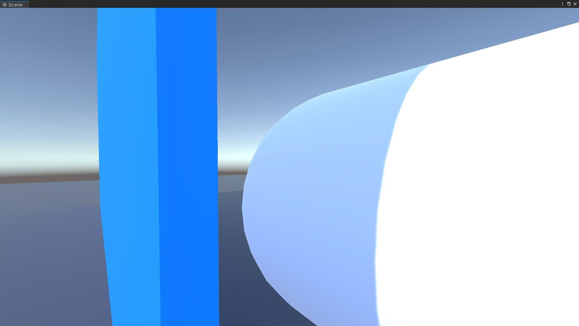 Blue wall casting a strong shadow on a white capsule.