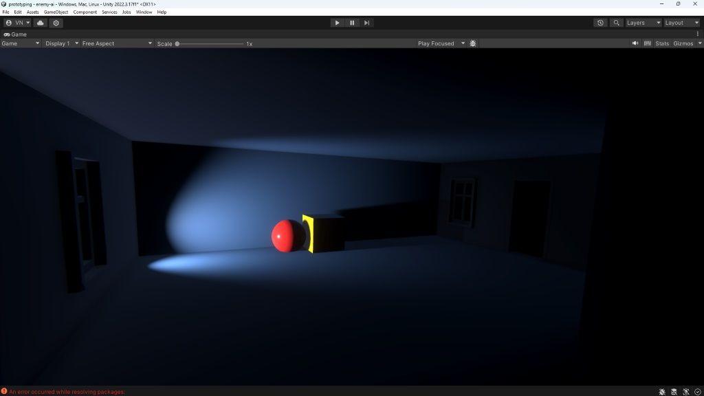 A spotlight in a house shining on a red ball and yellow square.